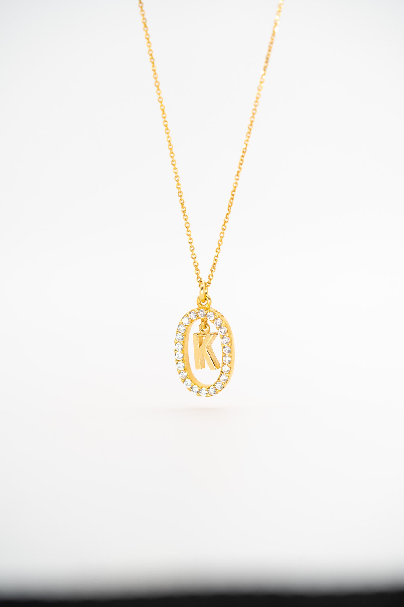 Personalized Gold Zirconia Initial Necklace – Letter "K"