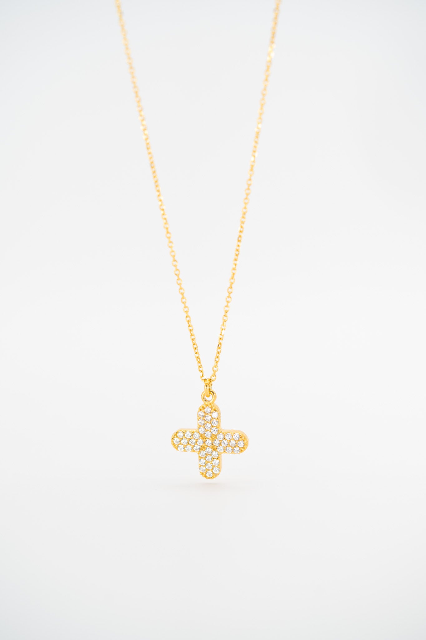 Radiant Gold Cross Necklace